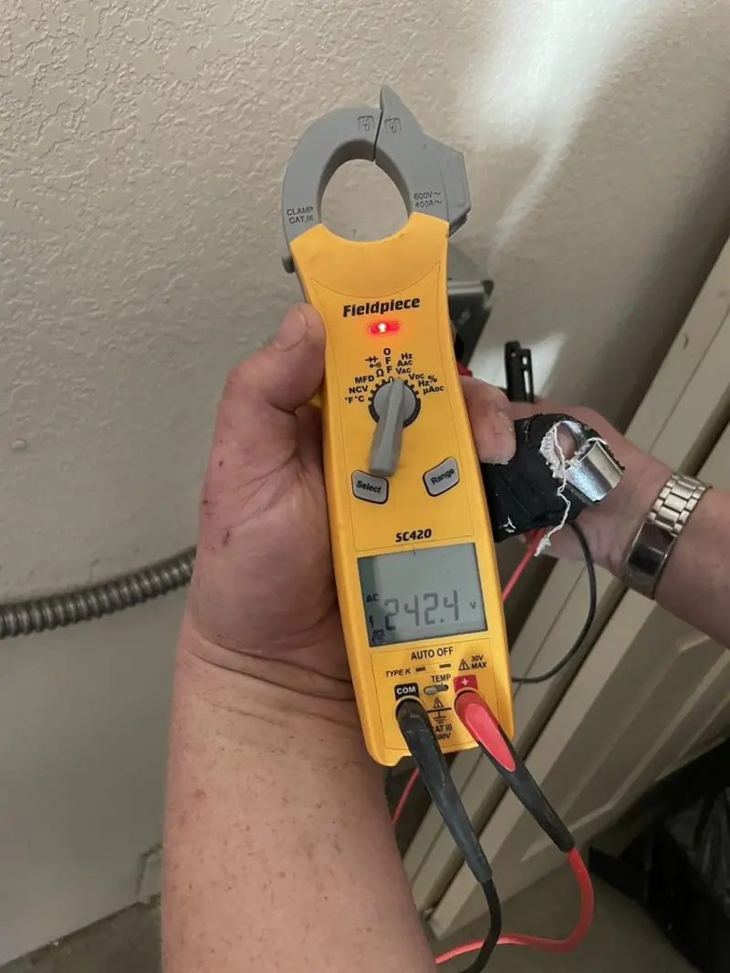 Voltage testing with clamp meter during Outlet Installation in Mahoning